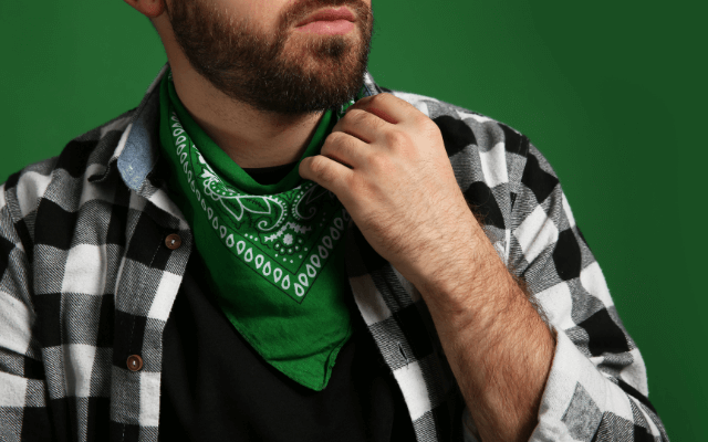 Fashionable young man in a green bandana