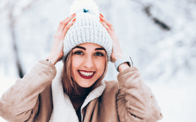 Beautiful woman in white beanie